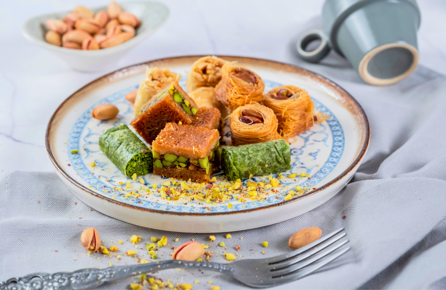 
                  
                    Mughe Gourmet Assortimento di baklava turca Confezione regalo da 150 g - Assortimento di pasticceria da forno XSmall
                  
                